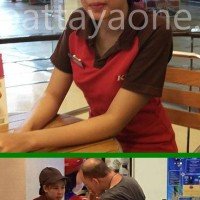 KFC-Mitarbeiterin füttert einen behinderten Ausländer