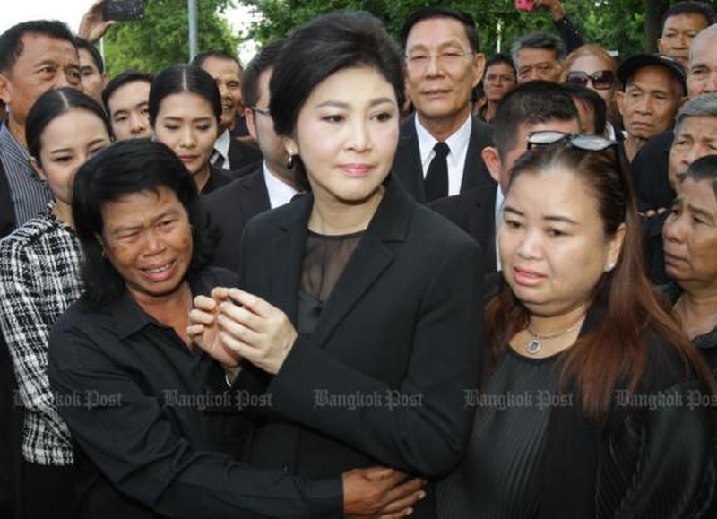 Yingluck versucht die Unterschiede in der Reispolitik herauszufinden