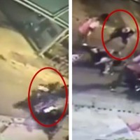Wütender Ausländer tritt nach einem Unfall auf eine verletzte Thai ein