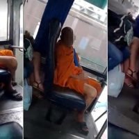 Mönch beim Masturbieren in einem Bangkoker Bus gefilmt