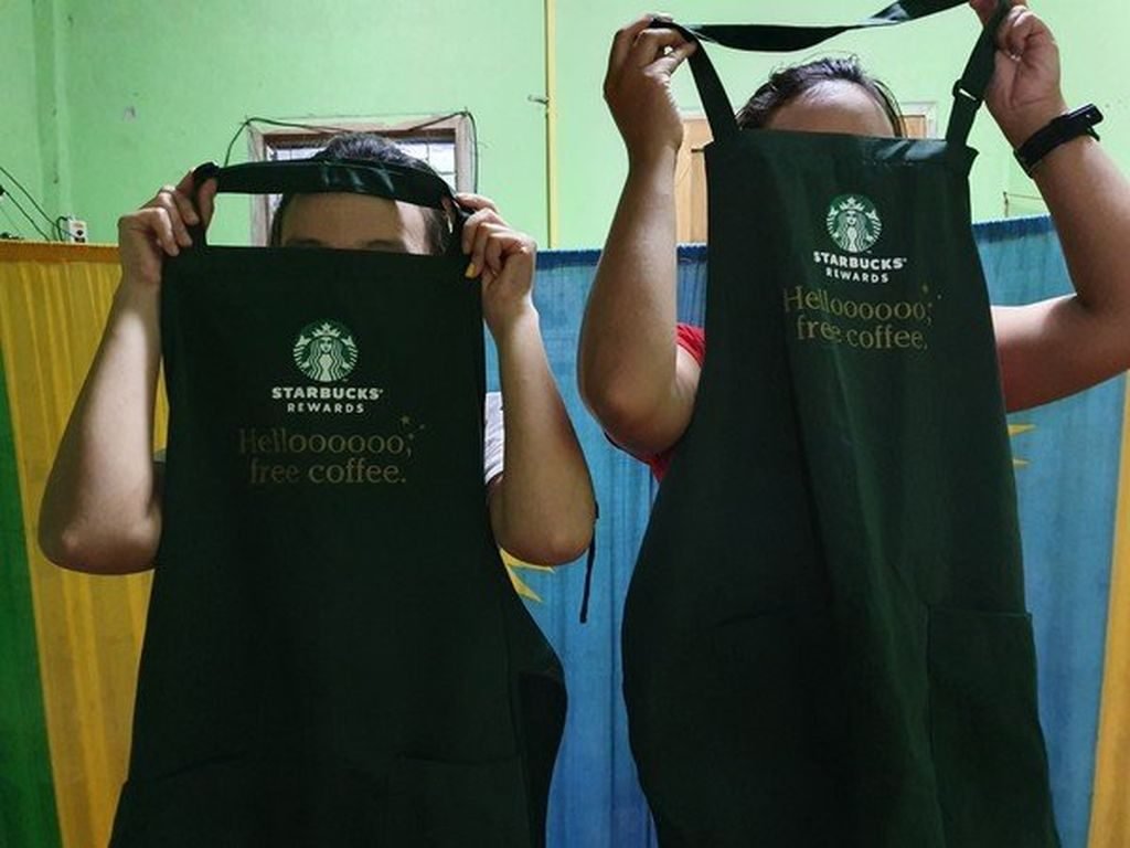 Bekleidungsfabriken die Starbucks beliefern, sollen ihren Arbeitern illegale unterbezahlte Löhne zahlen