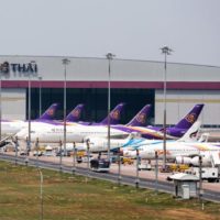 Stillgelegte Flugzeuge sind beschädigt, wenn die asiatische Sturmsaison beginnt