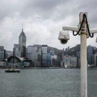 Aktivisten in Hongkong sagen, dass sie verdeckten Treffen, geflüsterten Drohungen und mysteriösen Telefonanrufen ausgesetzt sind, während Peking hart durchgreift.