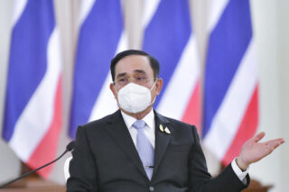 Premierminister Prayut Chan o-cha spricht am Freitag im Government House. (Foto des Regierungsgebäudes)