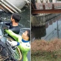 Bei einem tragischen Unfall kam ein junges Ehepaar ums Leben , das in Bangkok mit dem Motorrad in einen Kanal stürzte und sein 10 Monate altes Baby als Waise zurückließ . Die Polizei untersucht den Vorfall und überprüft CCTV-Aufnahmen, um die Unfallursache zu ermitteln.